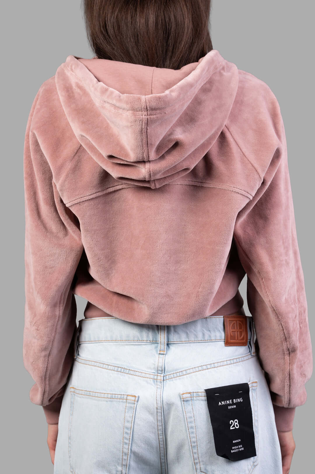 Vivienne Westwood Velvet Zip-up Hoodie shown from the back, featuring soft velvet fabric and an adjustable hood.