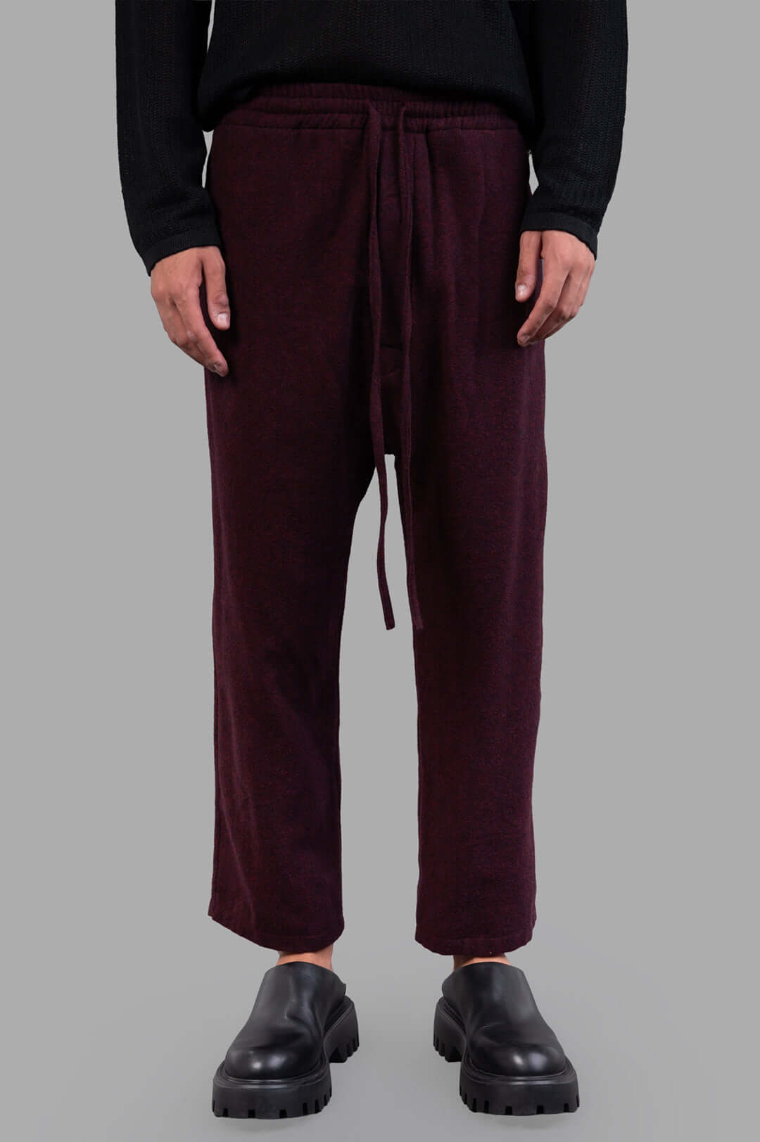 Marc Point Drawstring Trousers in burgundy, featuring an elastic waistband and adjustable drawstring, shown on model.