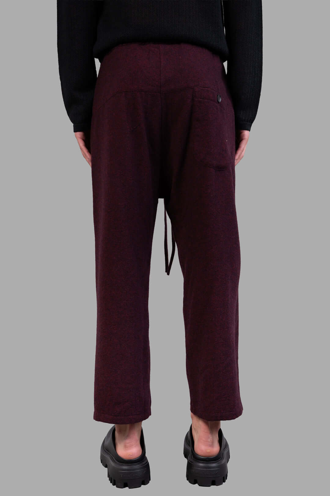 Marc Point Drawstring Trousers in burgundy, featuring a high-rise fit and adjustable waistband, shown from the back.