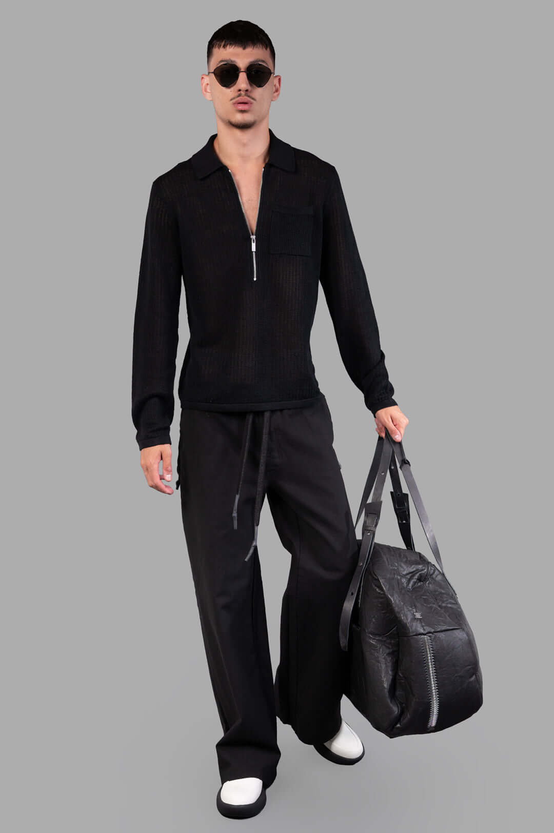 Helmut Lang Long-sleeve Zip Polo in Black, textured knit front view on model, airy linen fabric.