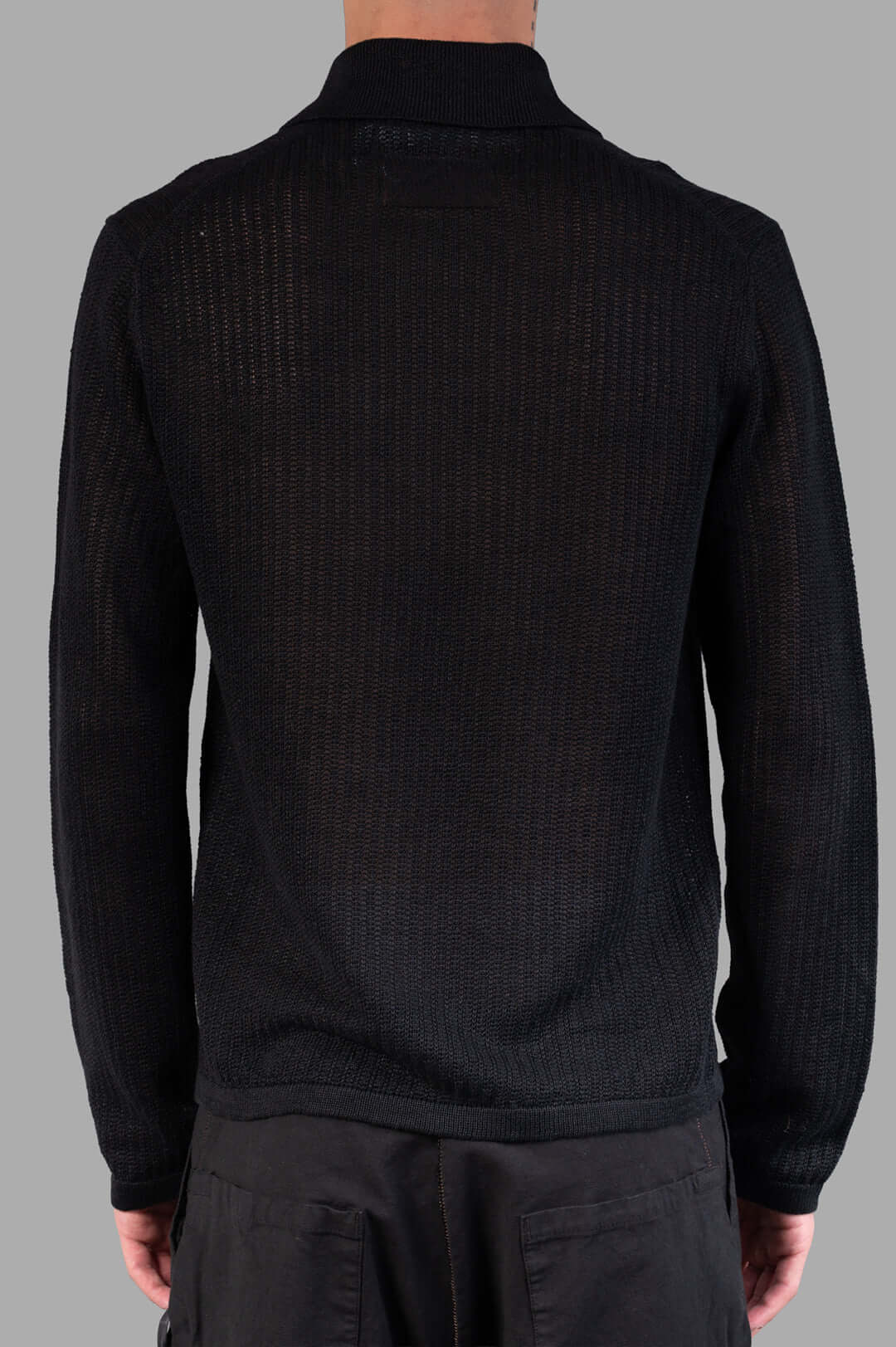 Helmut Lang Long-sleeve Zip Polo in Black, showcasing the back view, featuring textured linen knit and relaxed fit.