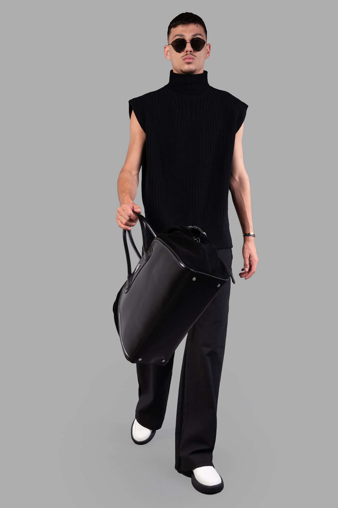 Rick Owens Concordians SL Fisherman Turtle, front view on model, showcasing ribbed texture and sleeveless design, in black.