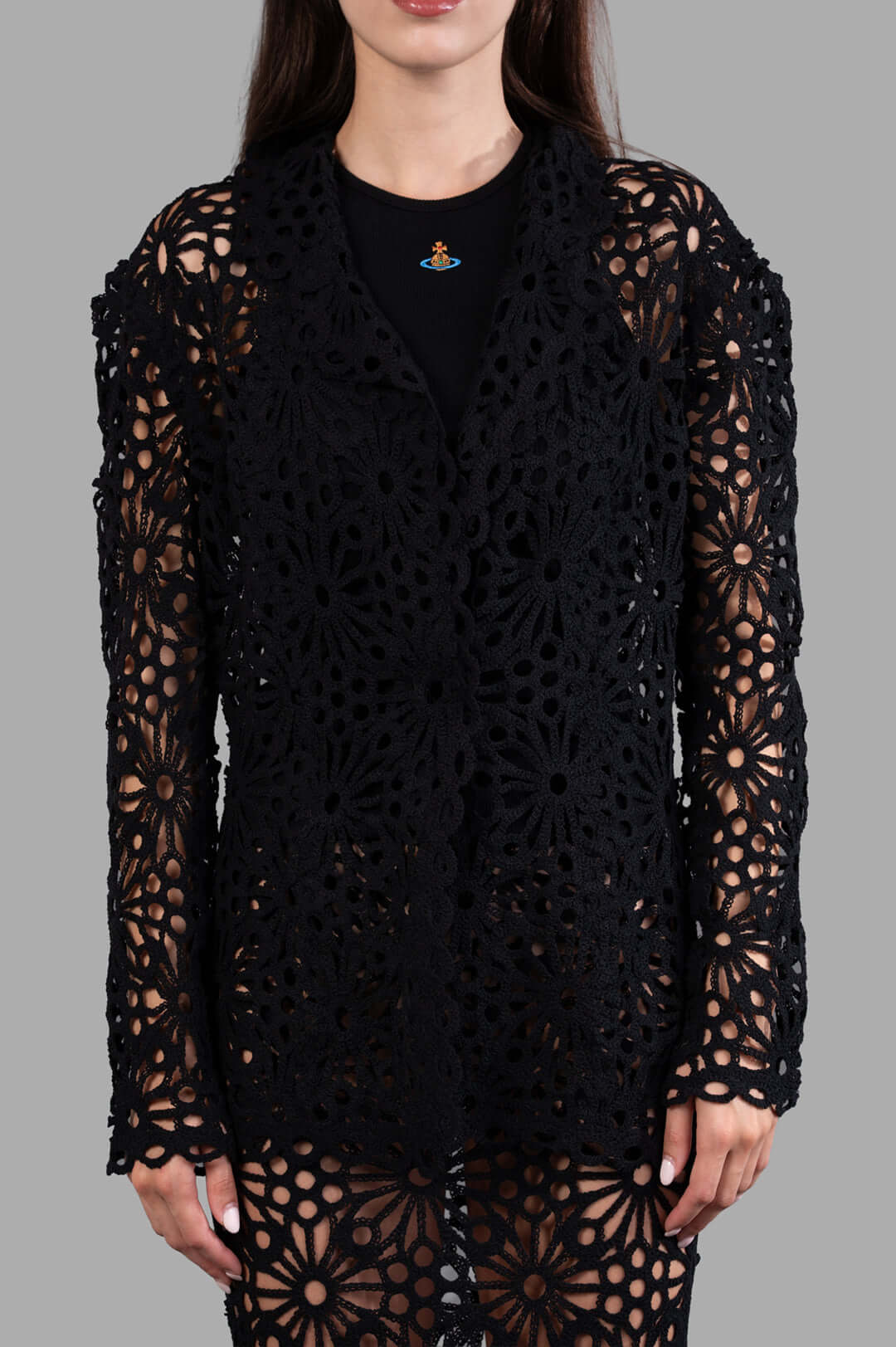 Norma Kamali Floral-motif Jacket featuring elegant black floral design, single-breasted cut, modeled for detail view.