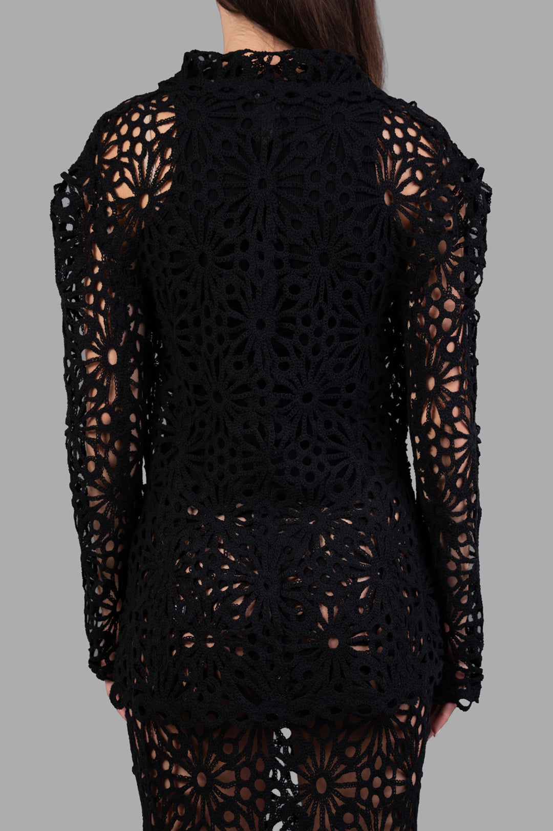Norma Kamali Floral-motif Jacket, black, showcasing refined floral details from the back, highlighting its elegant design.