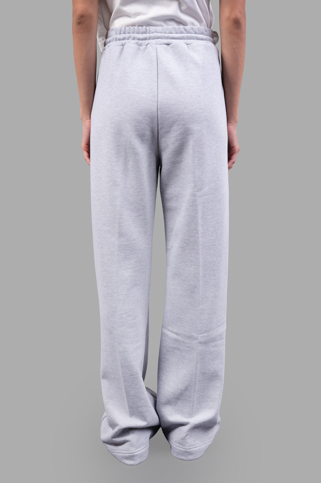 MSGM Logo Track Pants in grey, showcasing the back view with an elastic waistband and relaxed fit for comfort.