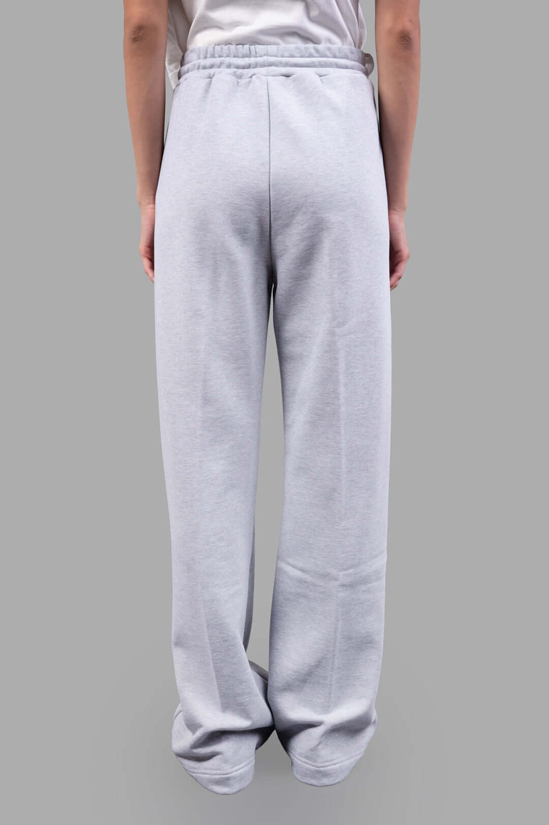 MSGM Logo Track Pants in grey, showcasing the back view with an elastic waistband and relaxed fit for comfort.