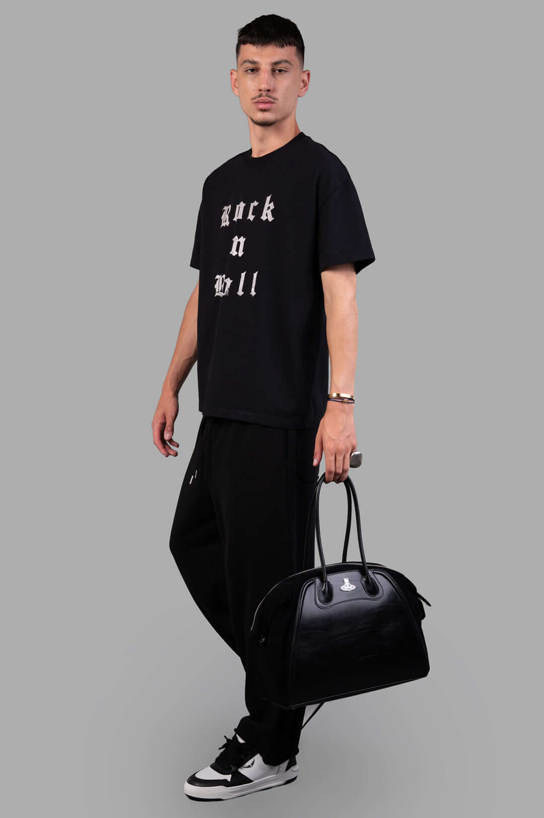 Zadig & Voltaire black Rock'n'roll T-shirt, front view on model, oversized fit, short sleeves, studded print, organic cotton.