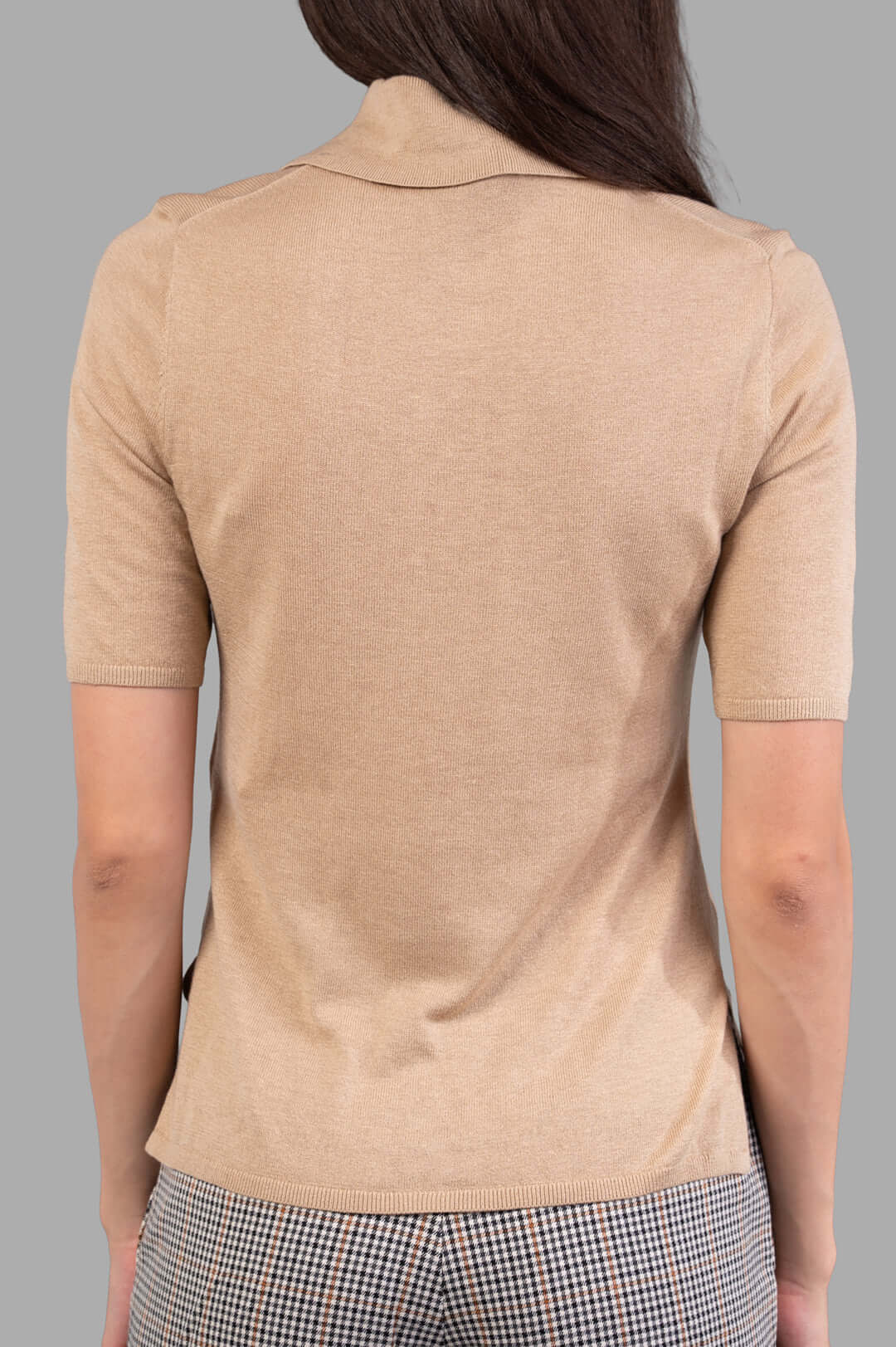 By Malene Birger Dotta Blouse in beige, showcasing the back and texture of the lightweight wool-silk blend design.