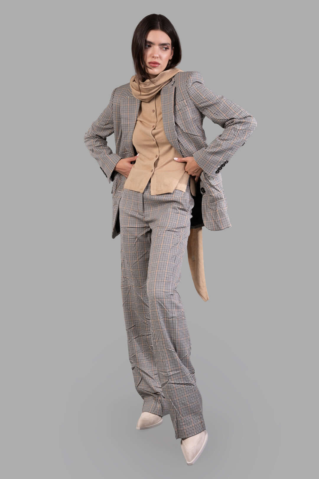 MSGM Asymmetric Creased Jacket, front view on-model, showcasing checkered pattern and unique design.