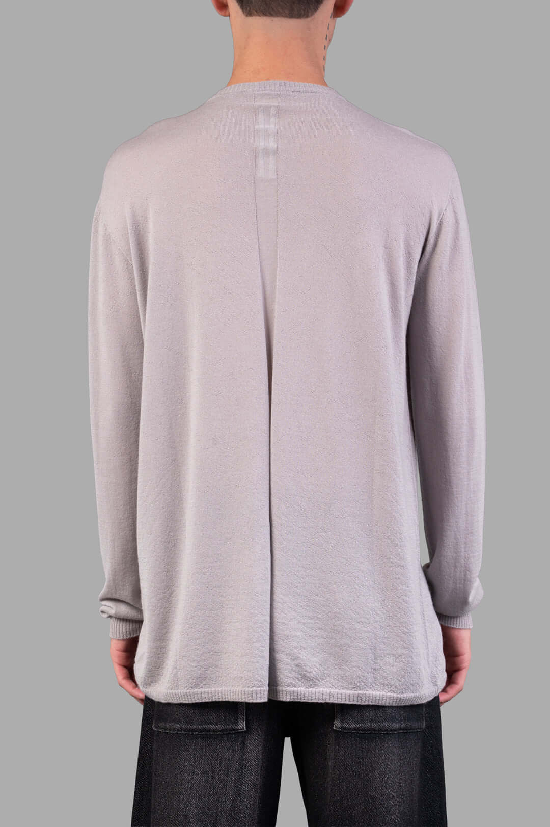 Rick Owens Crew Neck Wool Jumper in grey, showcasing the back detail and ribbed cuffs for a refined texture.
