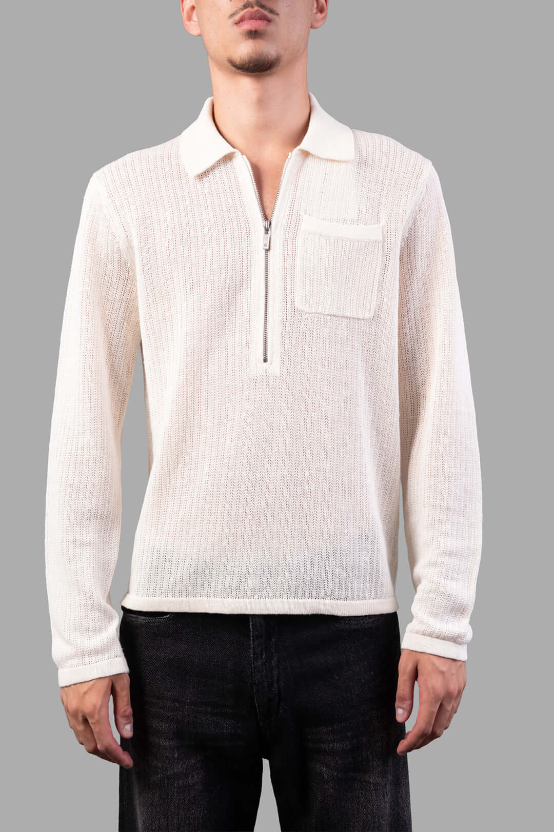 Helmut Lang Long-sleeve Zip Polo in white, relaxed fit with textured knit detail, showcased on model. Made of 100% linen.