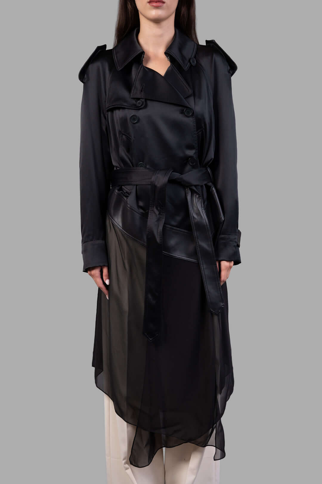 Helmut Lang Scarf Trench in black, featuring a double-breasted silk design, leather accents, and sheer chiffon hem on model.
