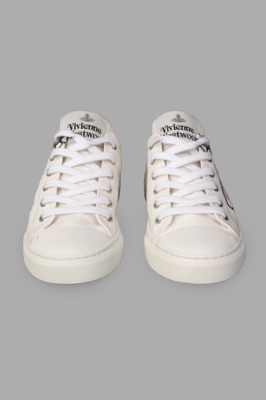 Vivienne Westwood Plimsoll Low Top Canvas Sneakers, front view with laces, featuring logo and white canvas material.
