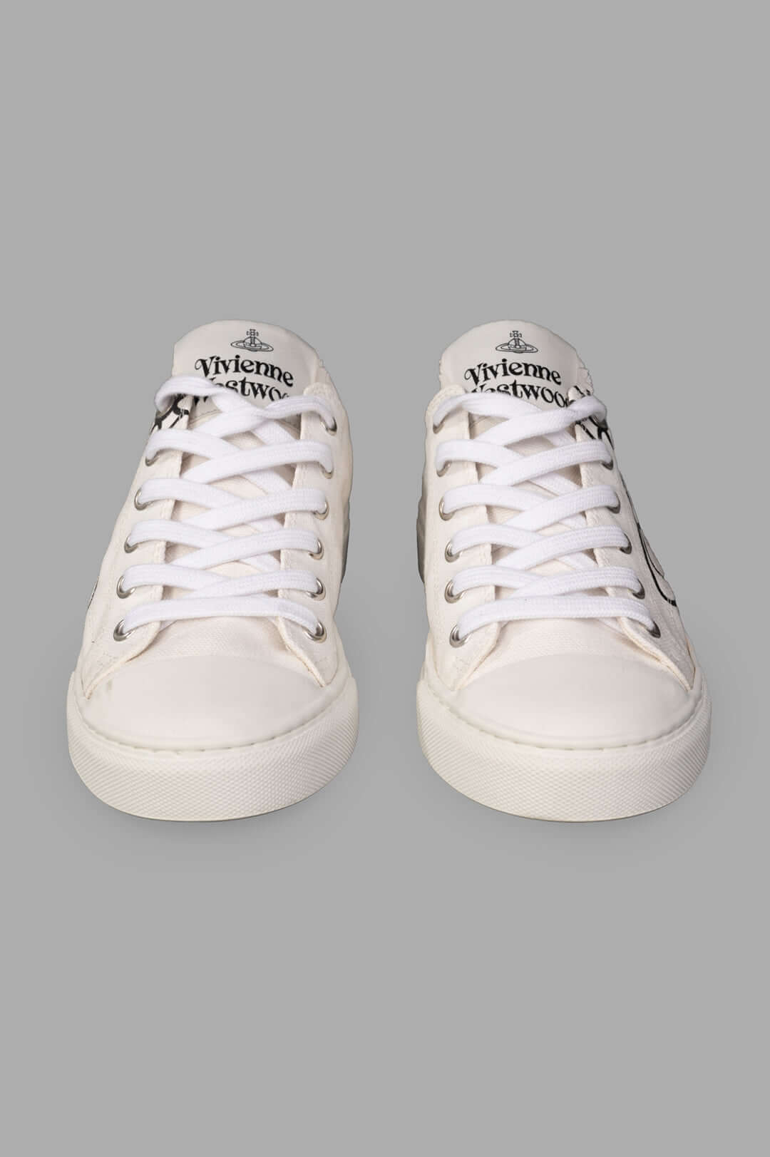 Vivienne Westwood Plimsoll Low Top Canvas Sneakers, front view with laces, featuring logo and white canvas material.