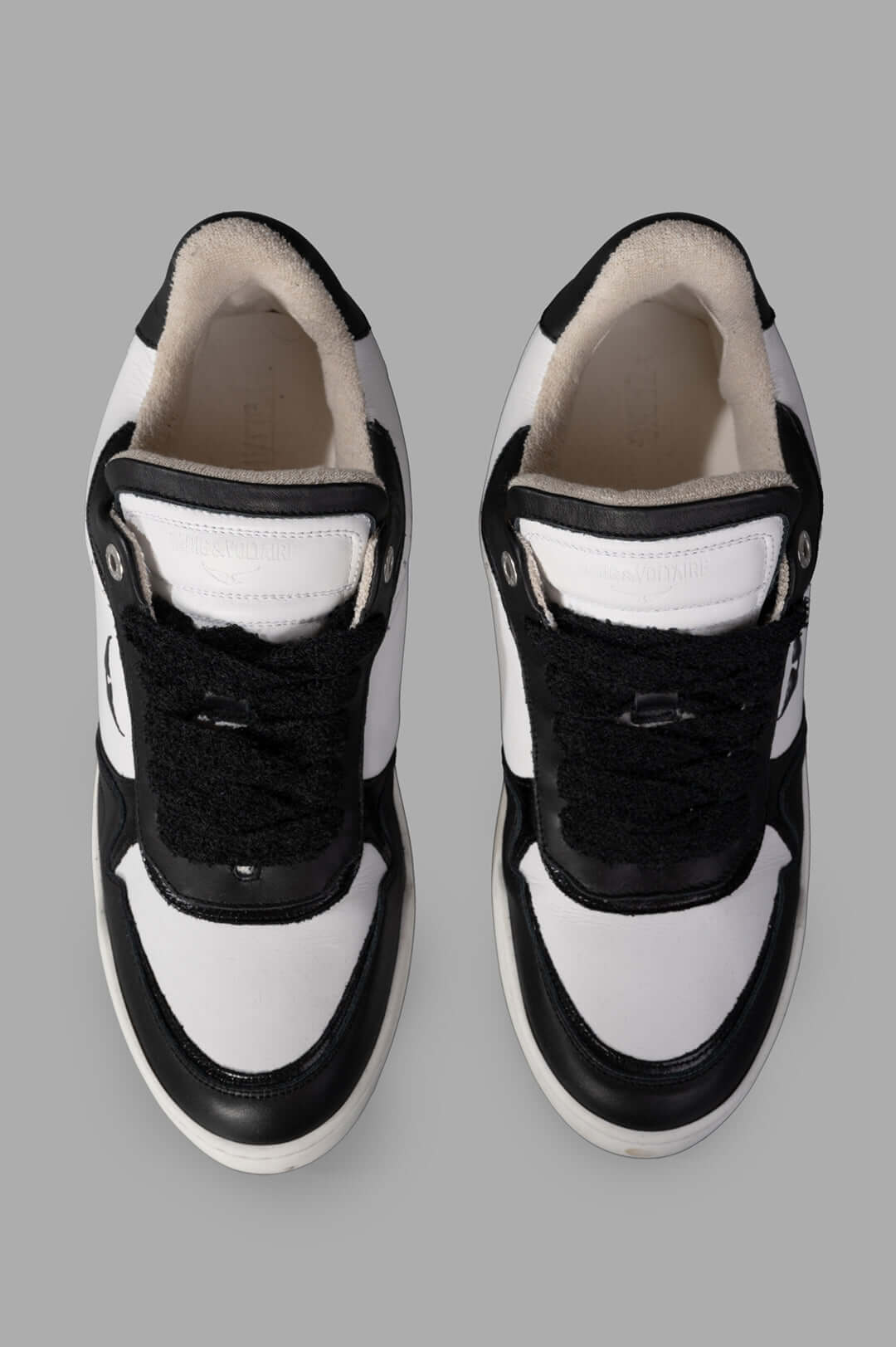 Zadig & Voltaire Low-Top Wings Trainers in smooth white and black leather, featuring detailed wing signatures and.