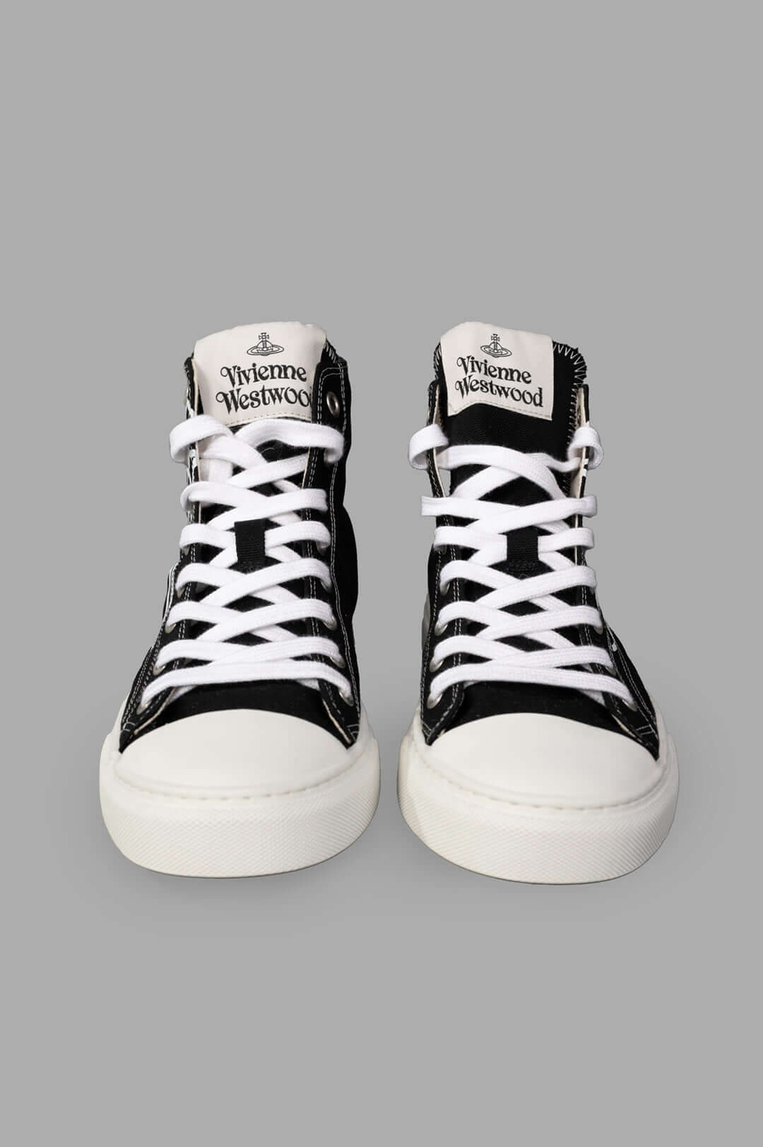 Vivienne Westwood Plimsoll High Top Canvas Sneakers featuring a black textile upper, white laces, and rubber sole, as shown.