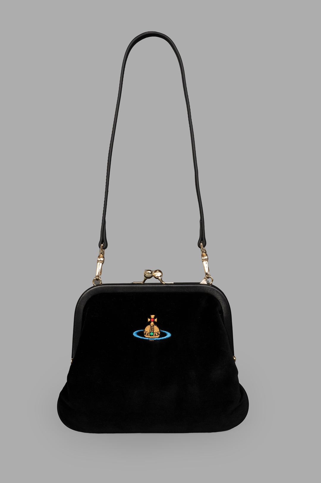 Vivienne Westwood Velvet Clutch in black velvet, front view with vintage-inspired clasp and embroidered logo detail.