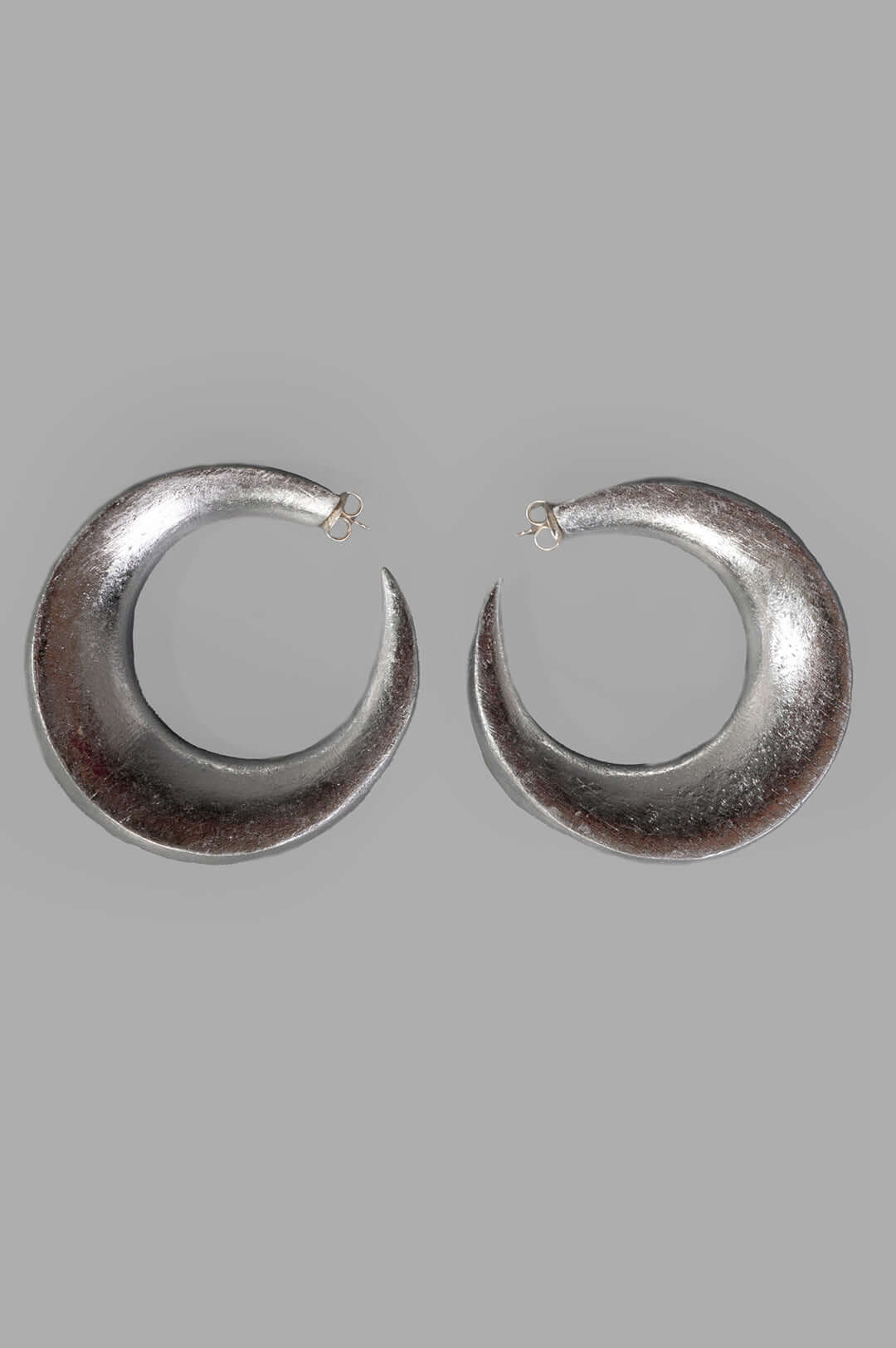 Monies Full Moon Stud Earrings front view featuring acacia wood and silver foil, showcasing elegant crescent design.