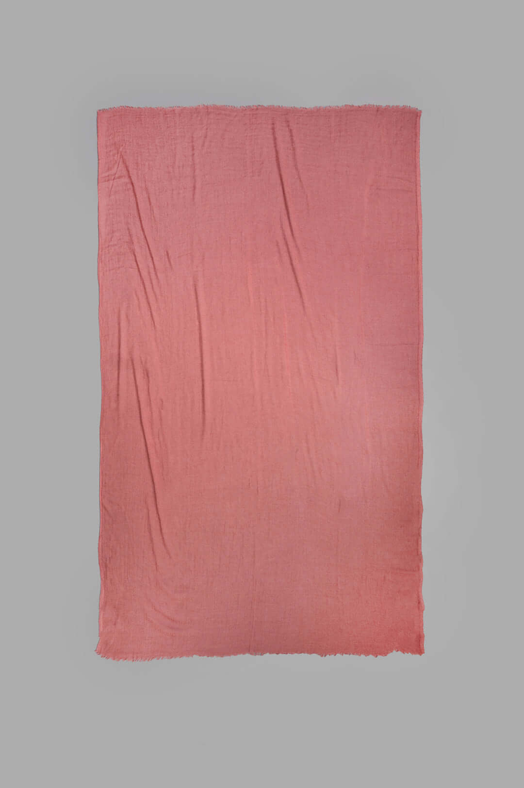 Rick Owens Concordians Follo Scarf in Rosewood, showcasing a luxurious blend of cashmere and silk, folded elegantly.