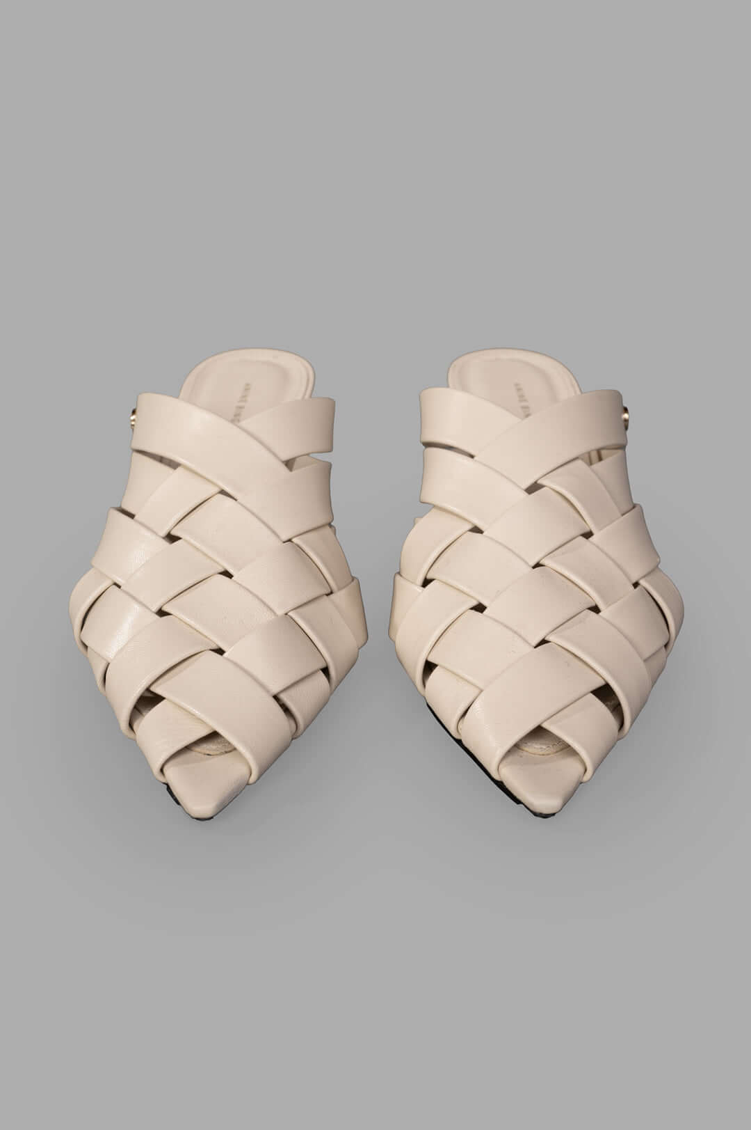 Anine Bing. Eve Mules featuring woven design and smooth 100% leather in bone color, showing the top view detail.