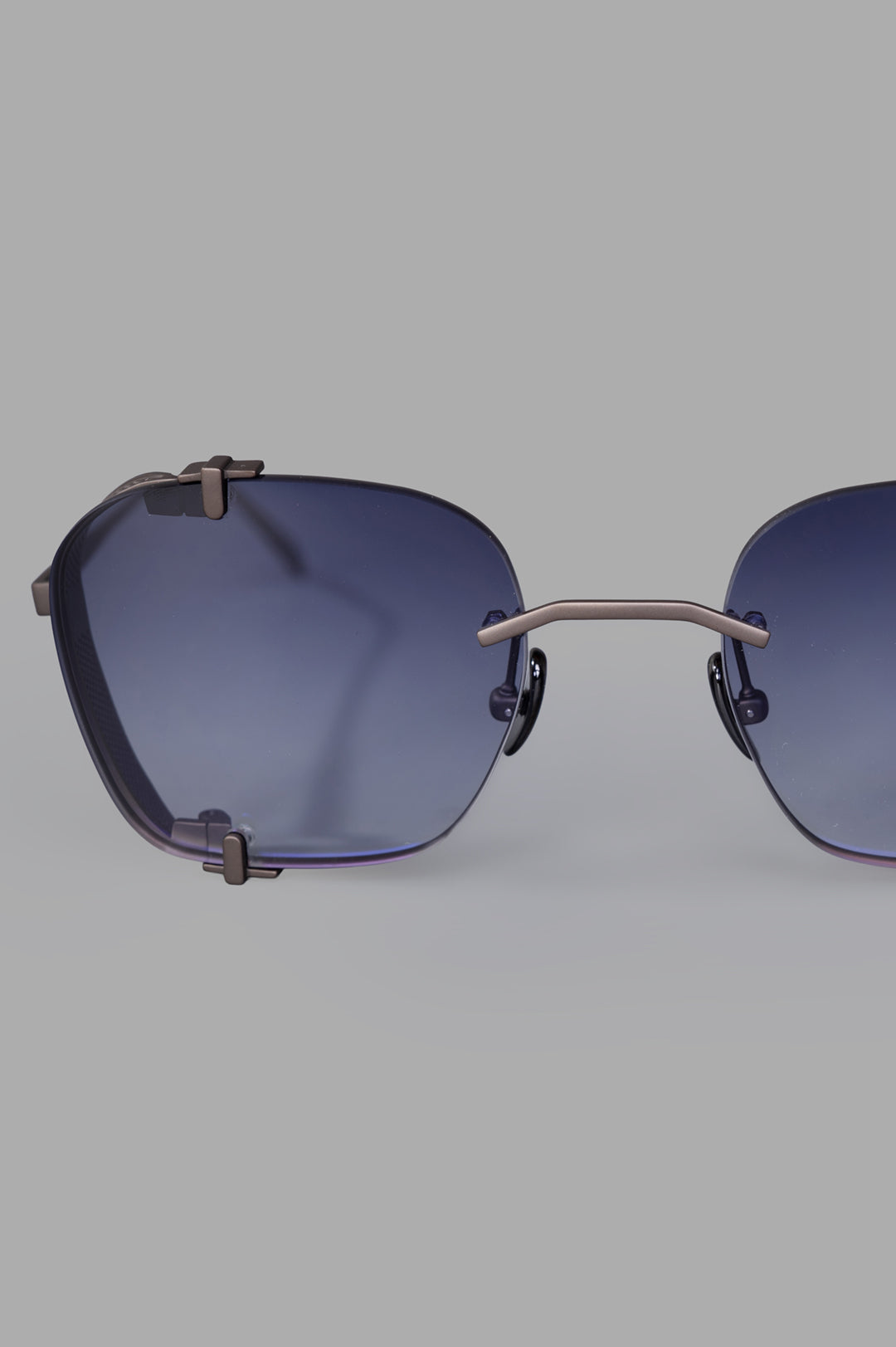 Vysen Eyewear. The Bei - BE2 rimless titanium sunglasses in black matte with stylish gradient lenses, showcasing a unique.