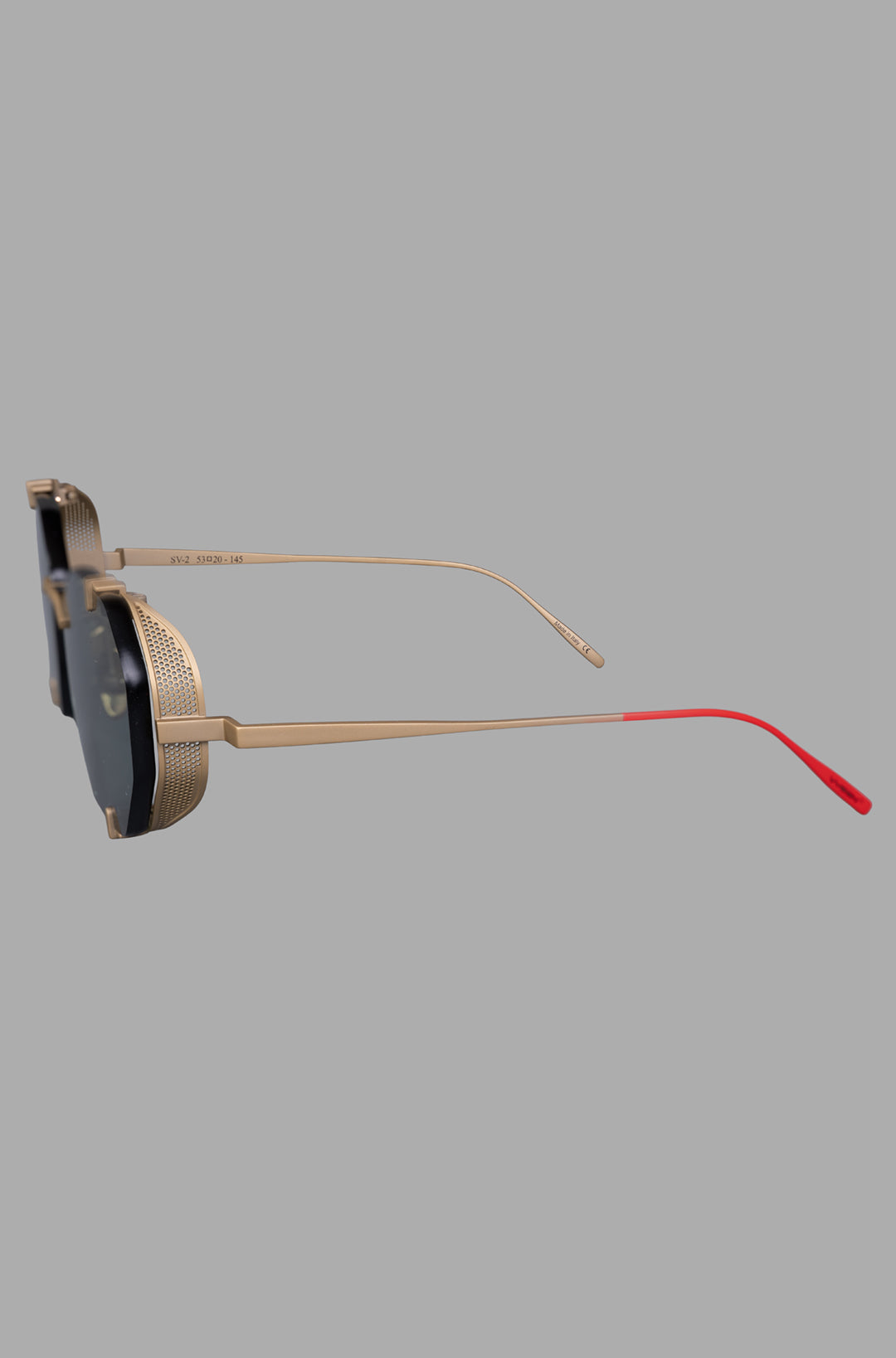 Vysen Eyewear. The Sever - SV2 side view showcases gold matte titanium frame and red temple tips with intricate detailing.