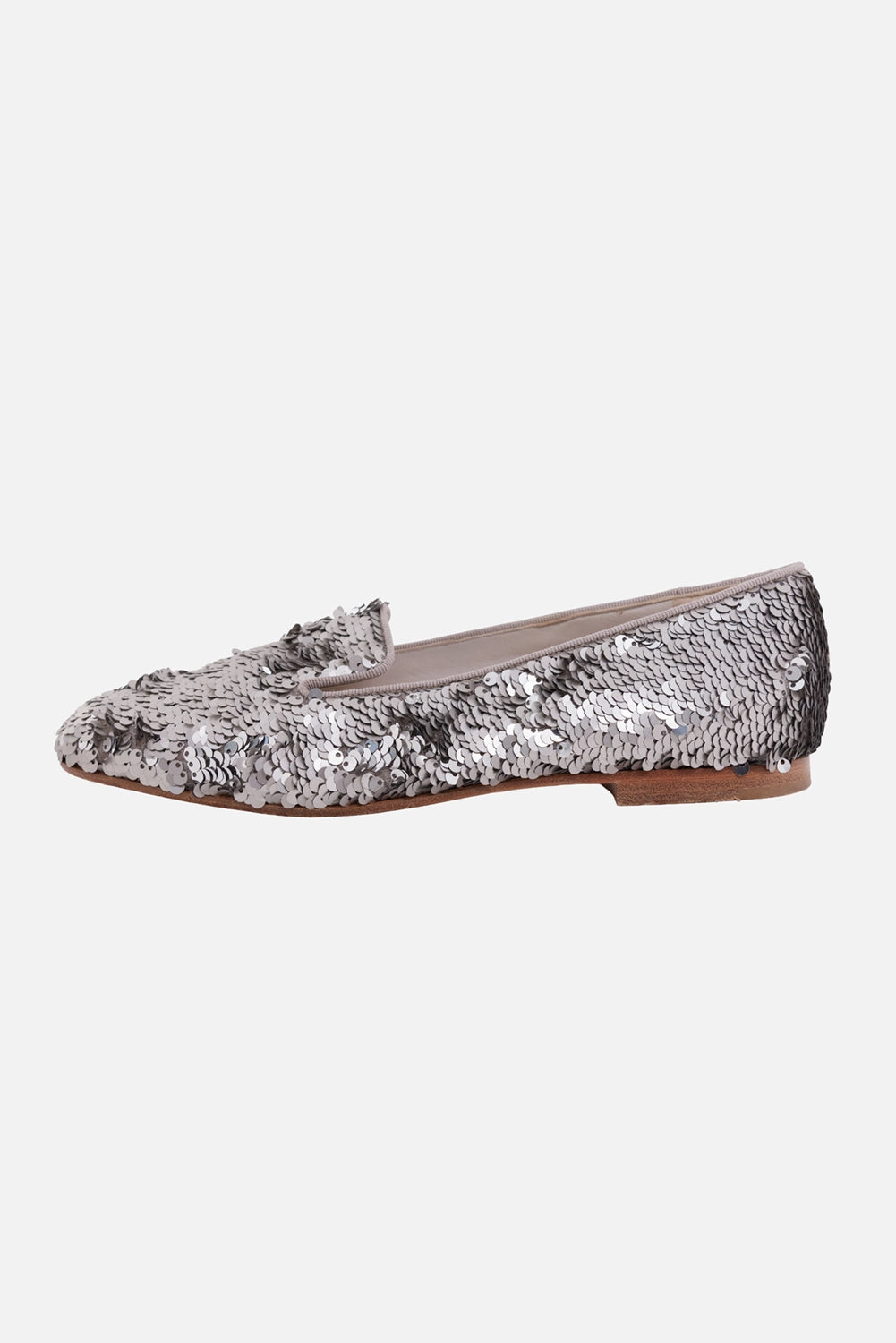 Chanel women's loafers in silver, side view, allover sequins with low stacked heel