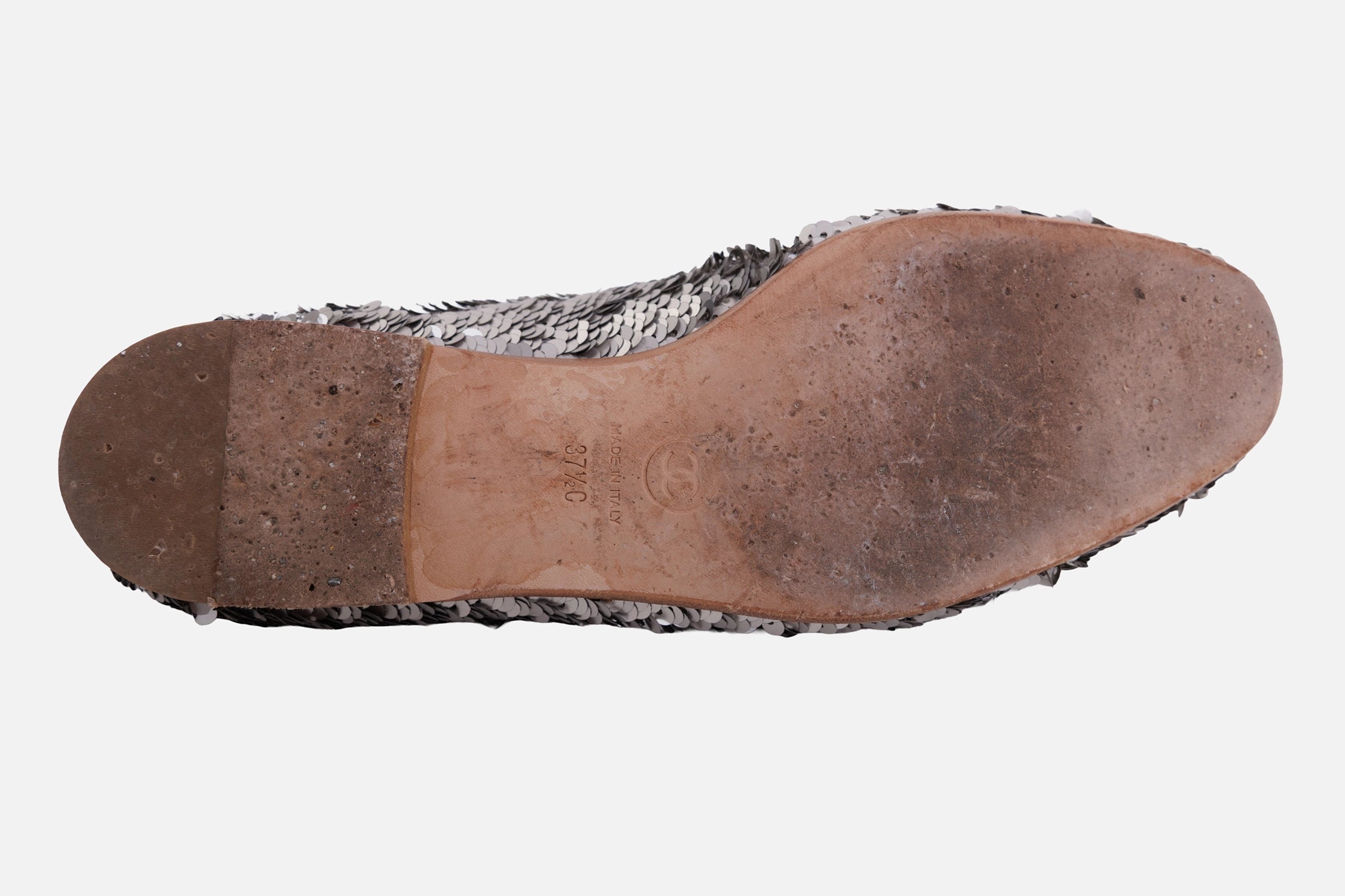 Chanel women's loafers in silver, sole view, leather outsole with visible wear and size stamp