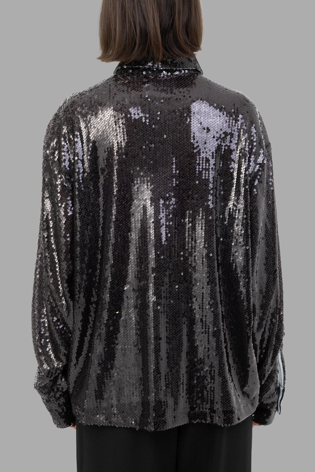Des Phemmes women's sequin shirt in Grey Gard, back view, dropped shoulders and fluid drape.