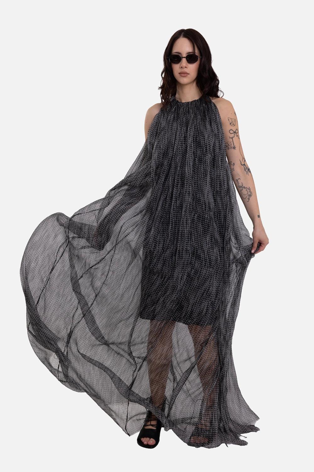 Giovanni Cavagna women's sheer halter dress in white/black, on-model full-length view, checked overlay and flowing hem