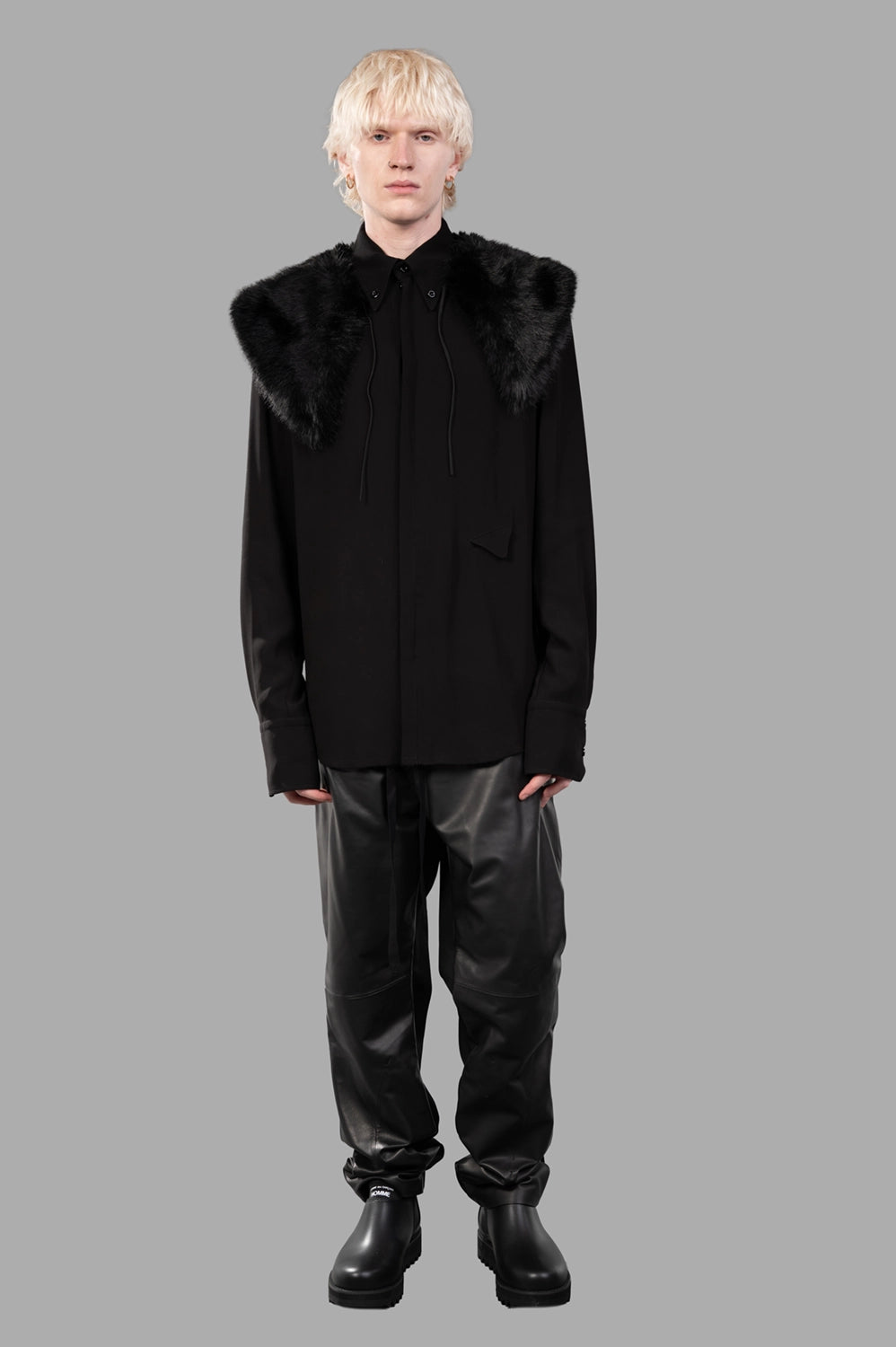 Marc Point shirt in black, on-model full length, concealed placket and elongated cuffs