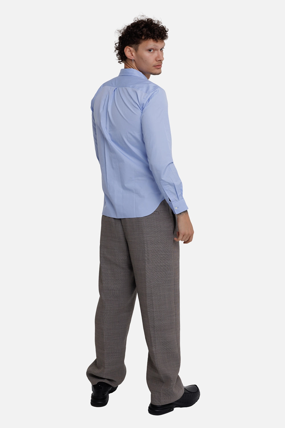 Comme des Garçons Homme Deux men's blue shirt, on-model back view with solid body and central back pleat