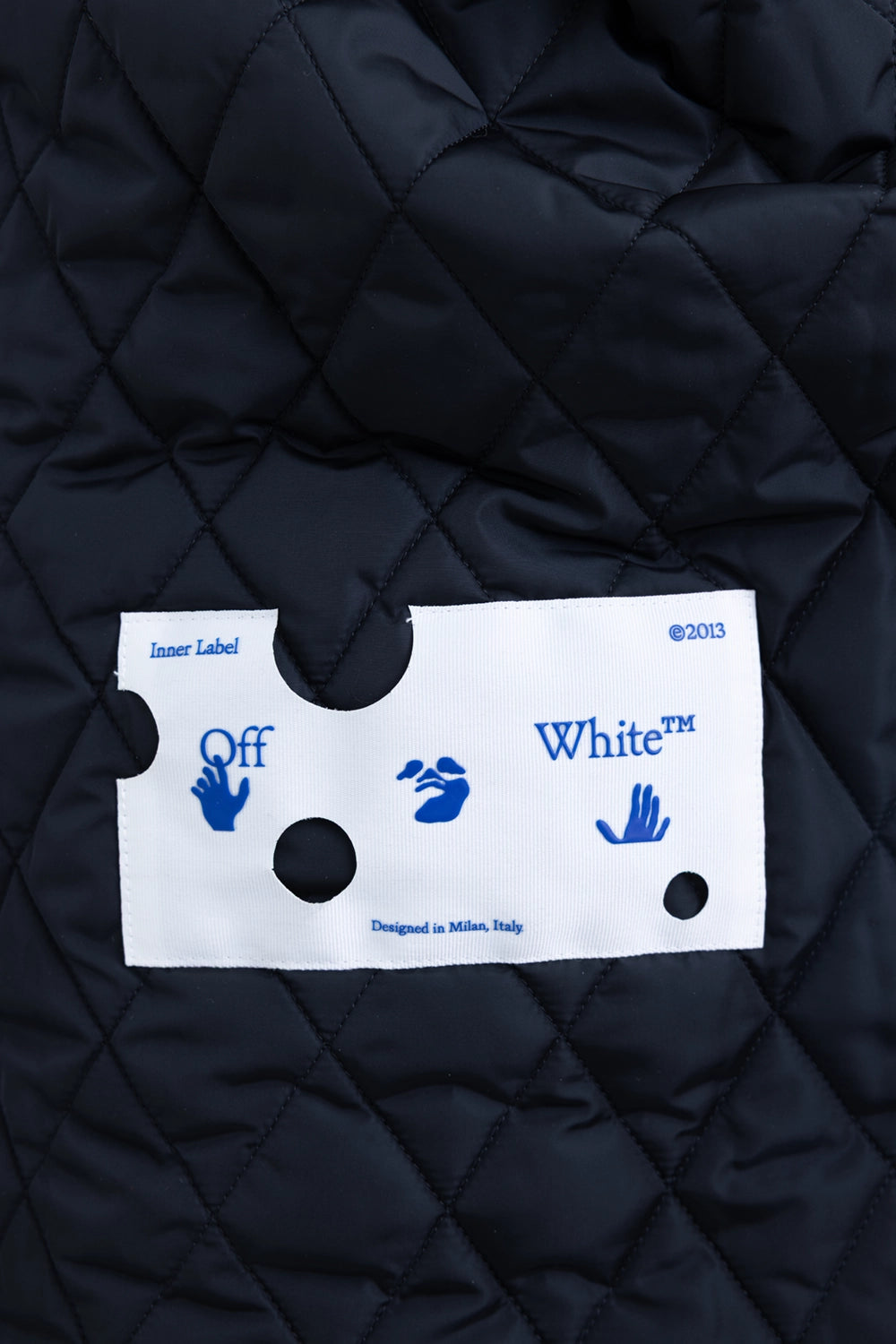 Pre-owned Off-White men's shirt jacket in blue/black check, interior label view, quilted lining detail