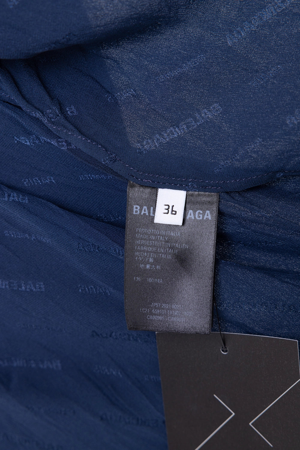 Pre-owned Balenciaga women's shirt in navy, fabric close-up, tonal logotype jacquard pattern.