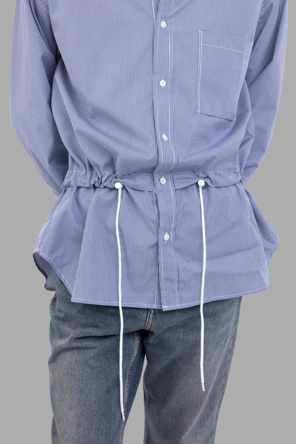 Comme des Garçons shirt in blue micro-stripe, waist drawstring detail