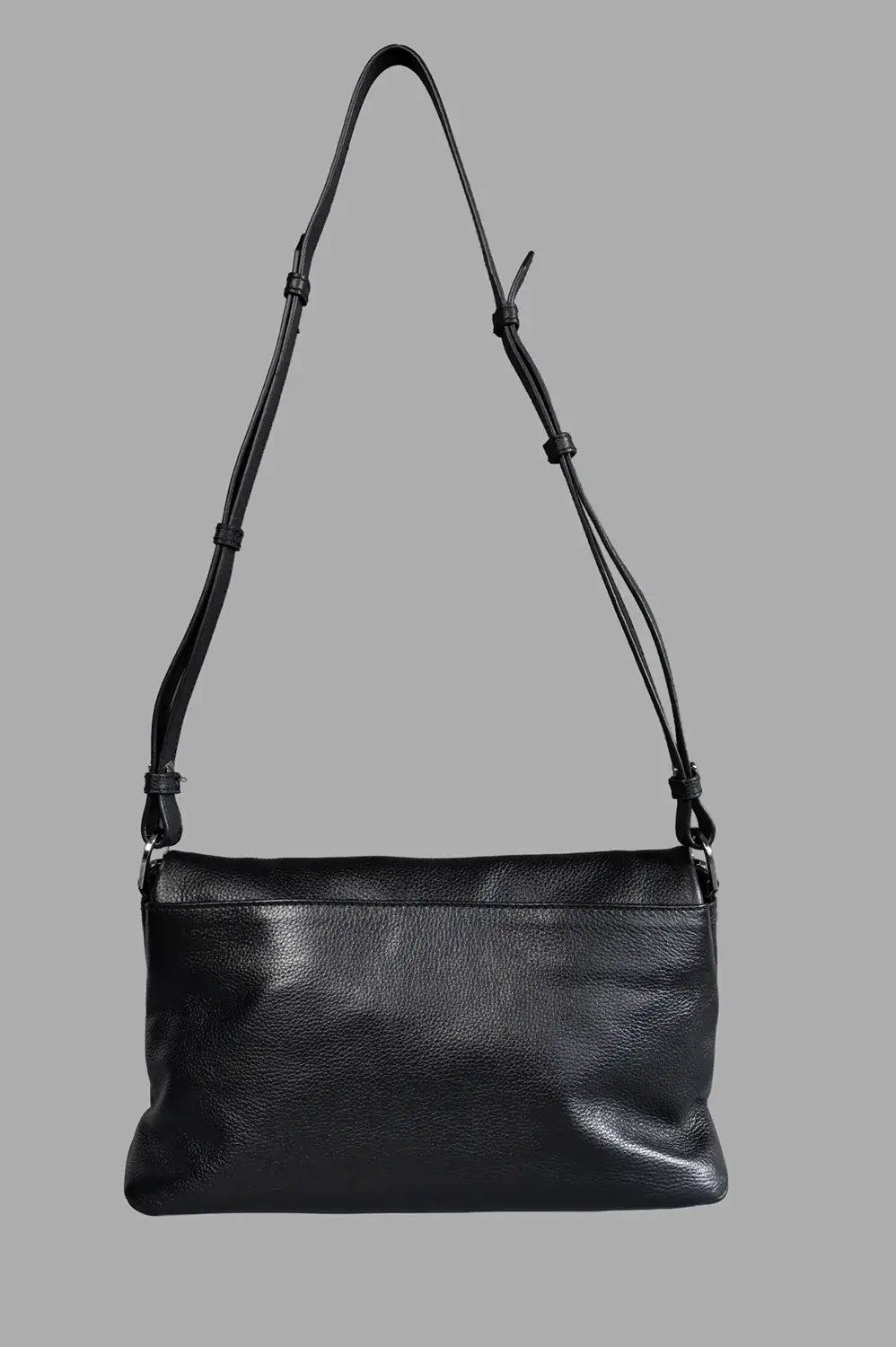Zadig & Voltaire shoulder bag in black, back view, smooth grained leather and adjustable strap