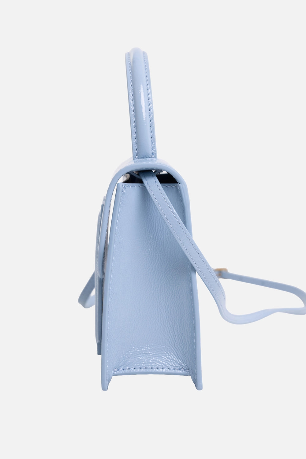 By Malene Birger women's handbag in Dream Blue, side view, patent finish with top handle and slim strap