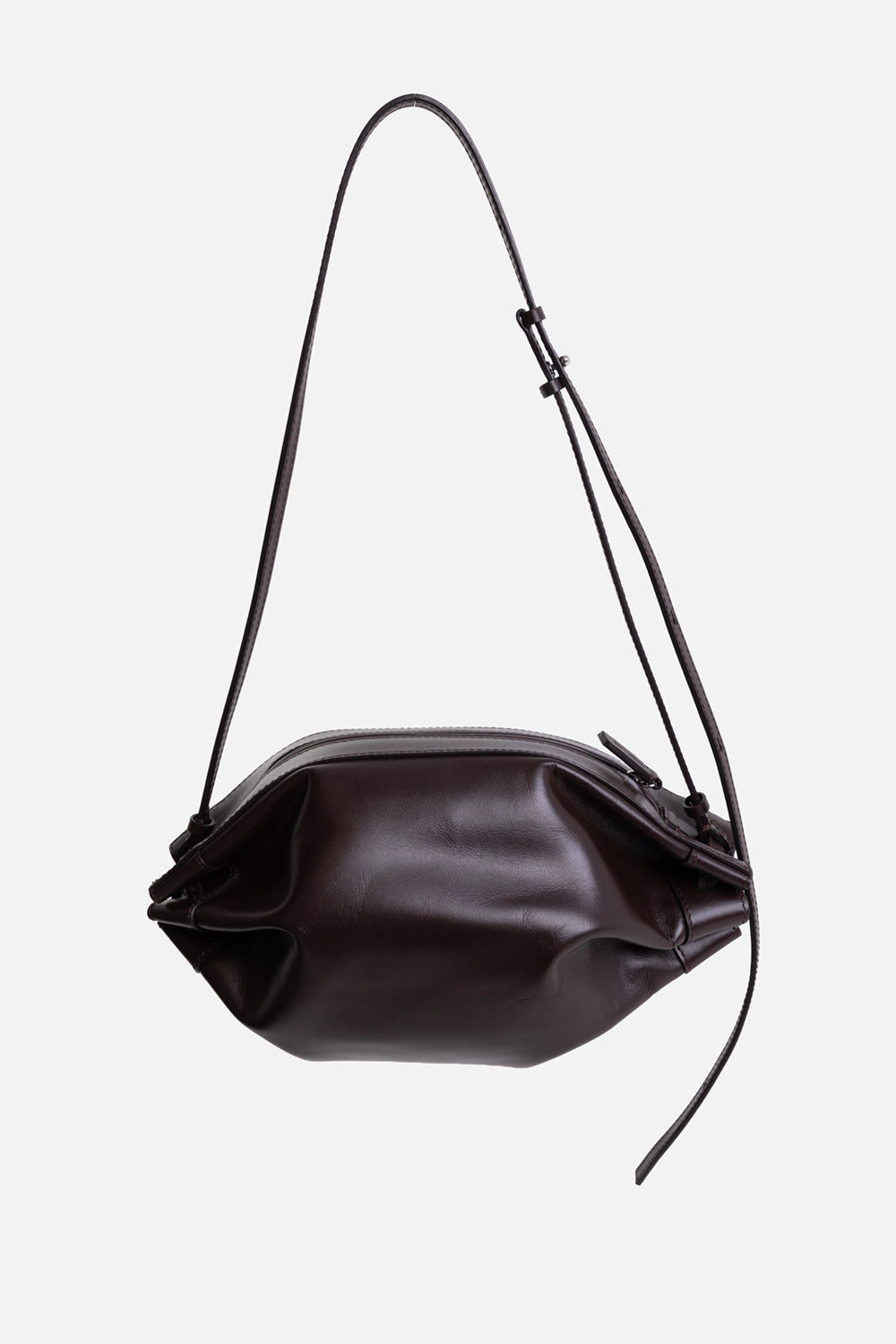 Helmut Lang women's shoulder bag in mahogany, side view, elongated strap and sculpted folded side panels