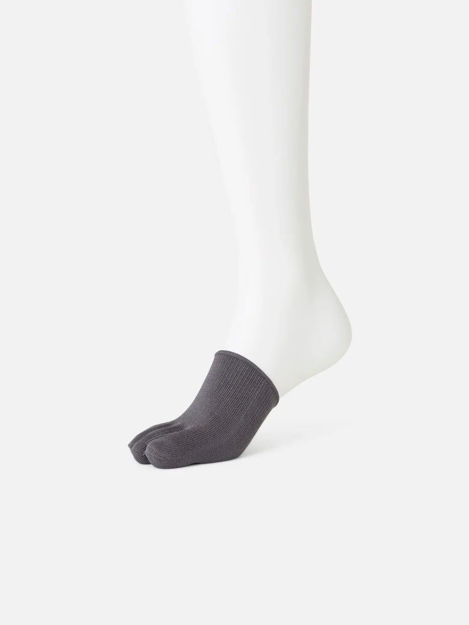 Tabio Silk 5-Toes Half Cover in dark blue, showcasing soft texture and five-finger design on a mannequin foot.