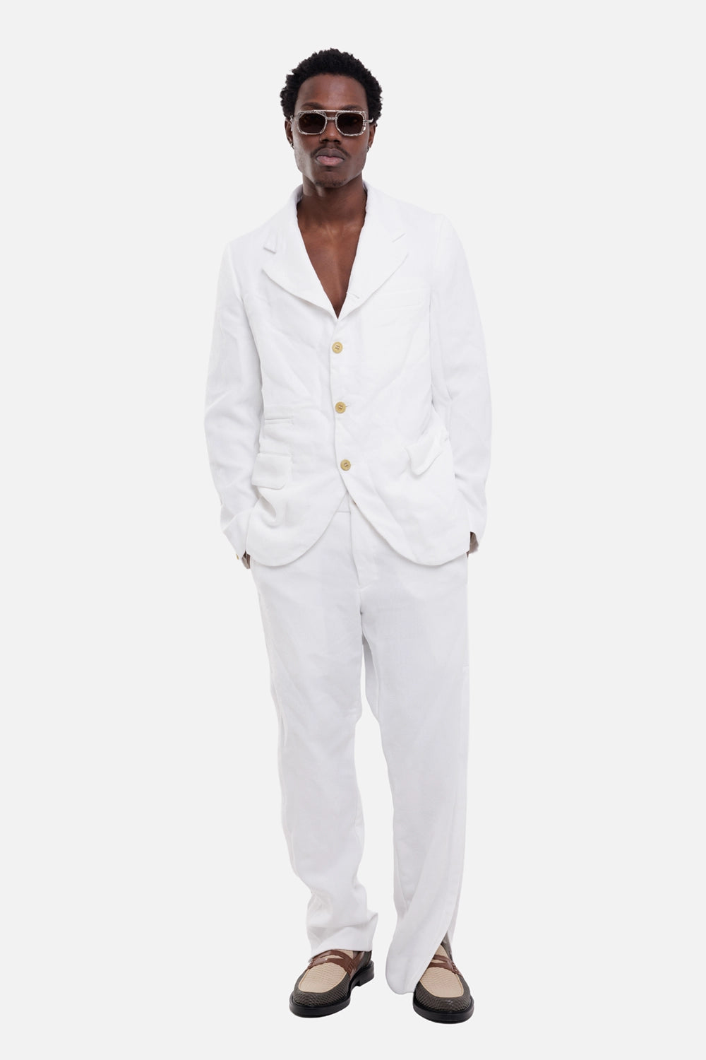 COMME des GARÇONS HOMME PLUS men's blazer in white, on-model full-length view, textured fabric and flap pockets