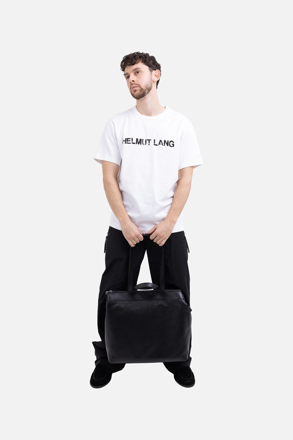 Helmut Lang men's ski pants in black, on-model full length, relaxed leg with slight flare