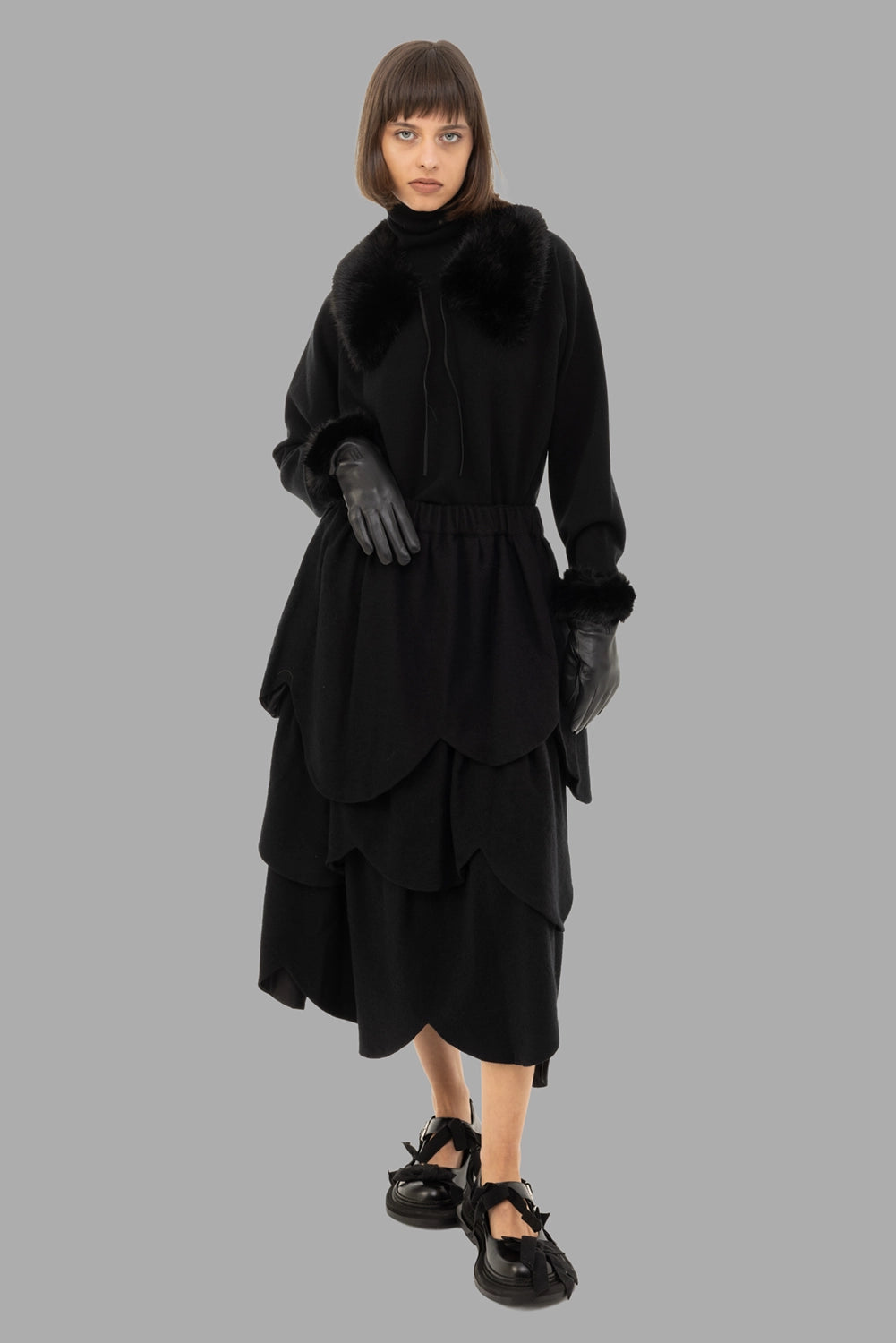 Noir Kei Ninomiya women's skirt in black, on-model full length, tiered petal layers and midi length