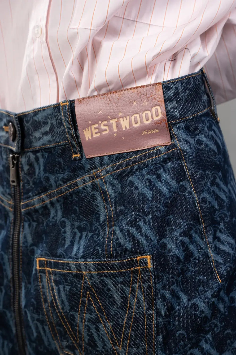 Vivienne Westwood skirt in laser denim, logo detail, pink WESTWOOD JEANS leather patch at waistband