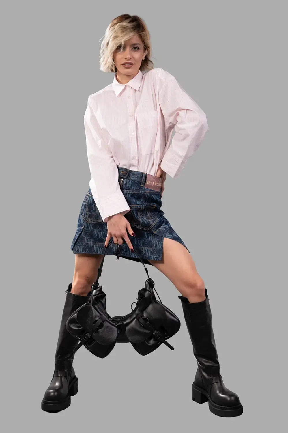 Vivienne Westwood skirt in laser denim, on-model full length, all-over VW monogram and asymmetrical hem