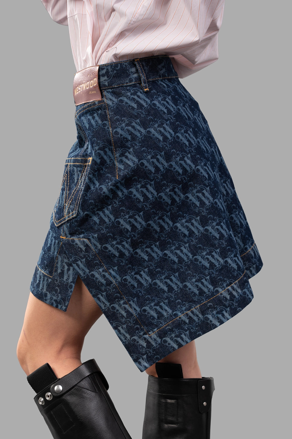 Vivienne Westwood skirt in laser denim, side view, vented hem and angled pocket