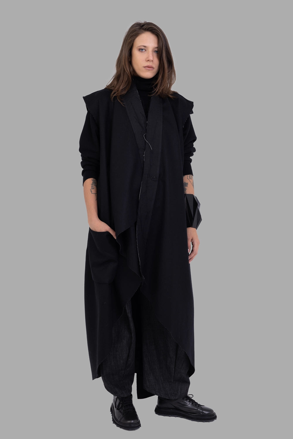 Giovanni Cavagna women sleeveless coat in black, on-model full length, waterfall front drape