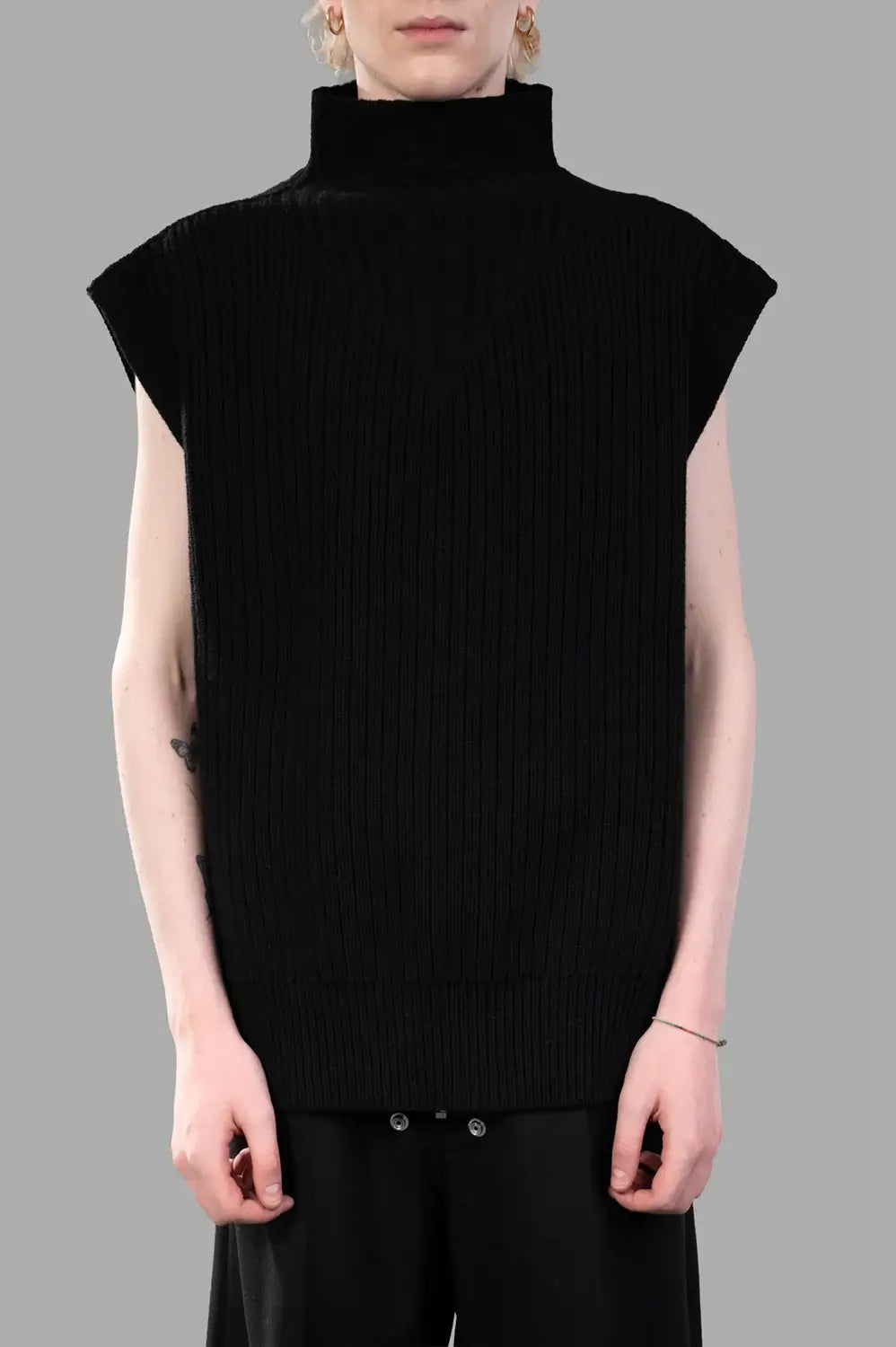 Rick Owens sleeveless turtleneck sweater in black, front view with V-rib panel and tall turtle neck