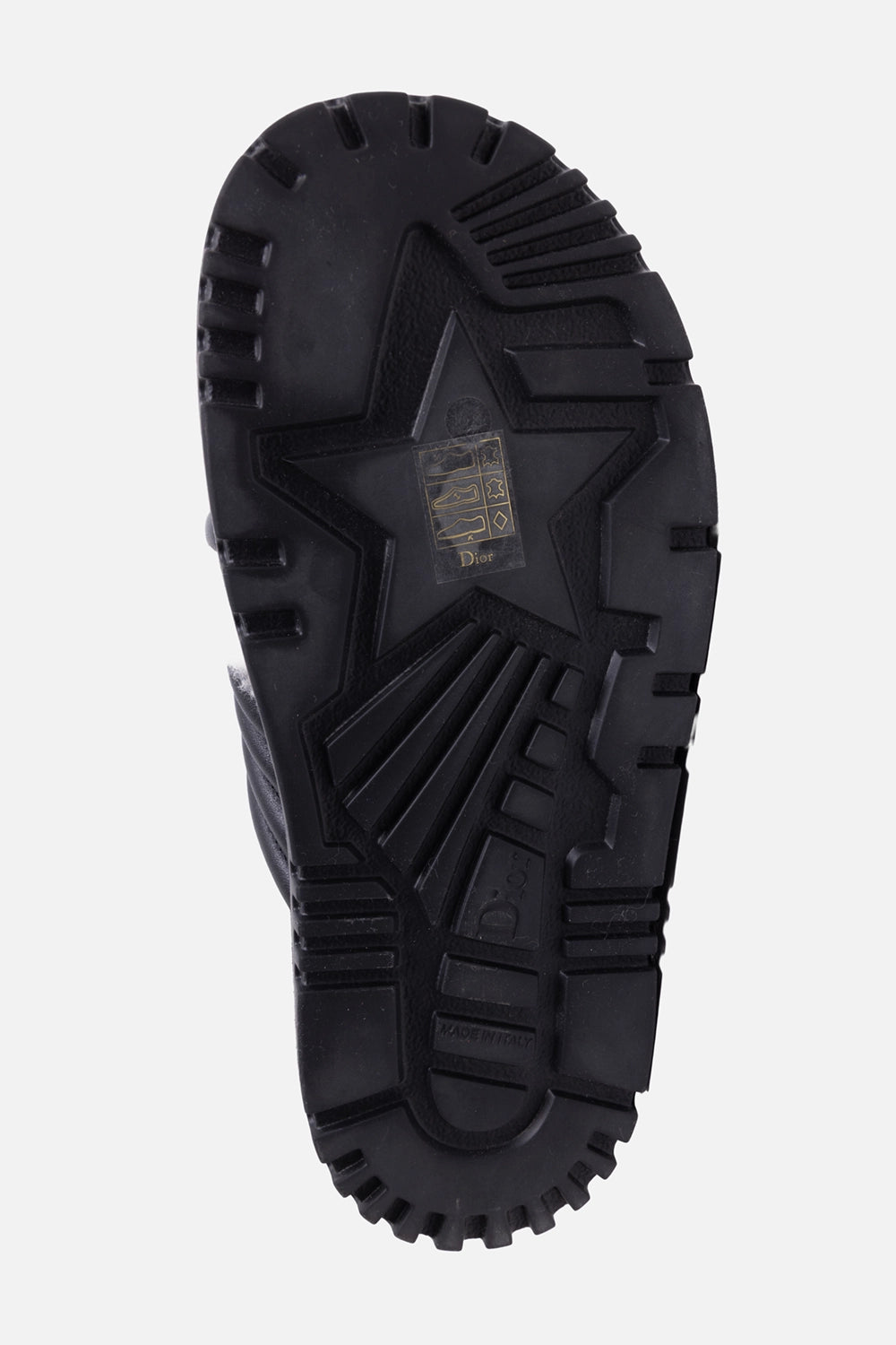 Pre-owned Christian Dior women’s slides in black and white, sole view, lug outsole with star motif