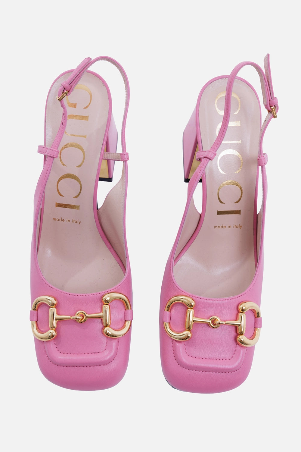 Gucci women's slingback pumps in pink leather, top view with square toes, gold Horsebit and logo insoles
