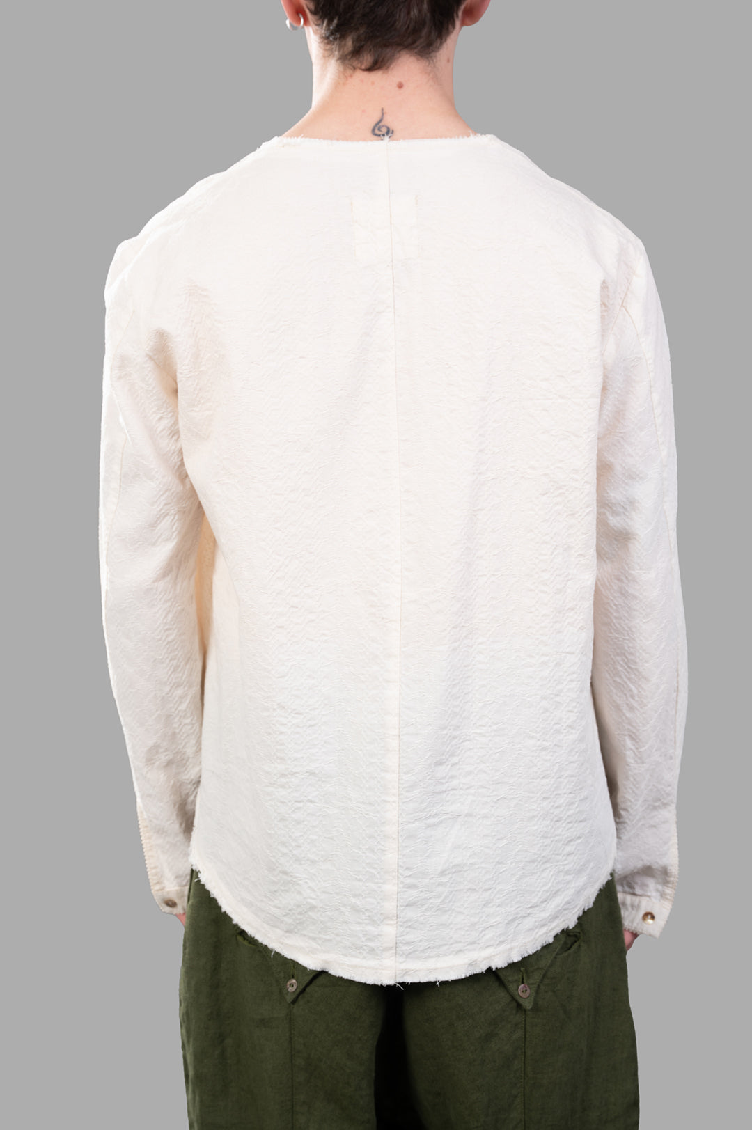 Marc Point V-neck Blouse in ecru, showcasing back view with textured cotton fabric and relaxed fit for comfort.